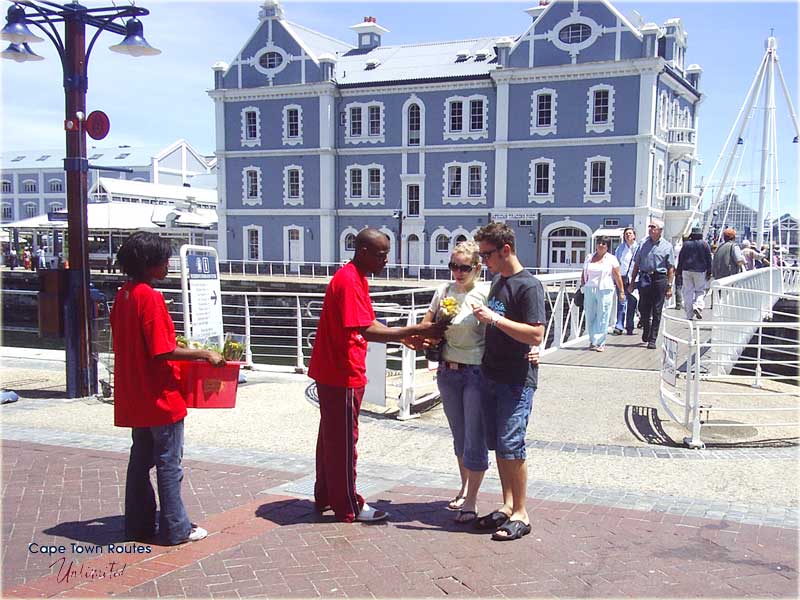 tourists receiving a flower bouquet